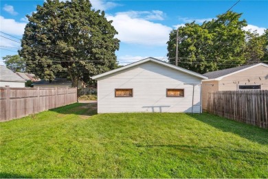 This 3-bedroom, 2-bath home features beautiful natural woodwork on Phalen Park Golf Course in Minnesota - for sale on GolfHomes.com, golf home, golf lot