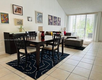 SPACIOUS BRIGHT 2 BEDROOM 2 BATHROOM AT THE GREENS AT DORAL on Jim McLean Signature Course in Florida - for sale on GolfHomes.com, golf home, golf lot