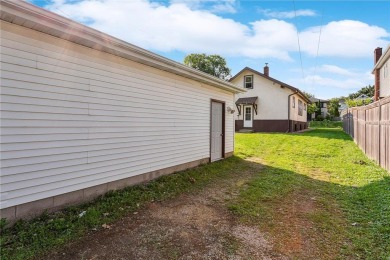 This 3-bedroom, 2-bath home features beautiful natural woodwork on Phalen Park Golf Course in Minnesota - for sale on GolfHomes.com, golf home, golf lot