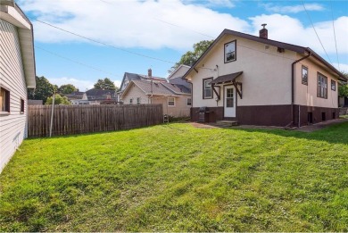 This 3-bedroom, 2-bath home features beautiful natural woodwork on Phalen Park Golf Course in Minnesota - for sale on GolfHomes.com, golf home, golf lot