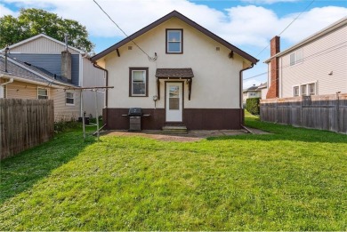 This 3-bedroom, 2-bath home features beautiful natural woodwork on Phalen Park Golf Course in Minnesota - for sale on GolfHomes.com, golf home, golf lot