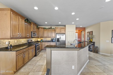 This beautifully upgraded 1,612 sq ft Gala model in Sun City on Copper Canyon Golf Club in Arizona - for sale on GolfHomes.com, golf home, golf lot