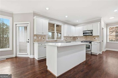 Experience the best of resort-style Eagle Watch living in this on Canongate At Eagle Watch Golf Club in Georgia - for sale on GolfHomes.com, golf home, golf lot