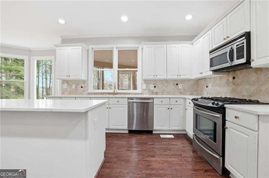 Experience the best of resort-style Eagle Watch living in this on Canongate At Eagle Watch Golf Club in Georgia - for sale on GolfHomes.com, golf home, golf lot