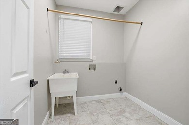 Experience the best of resort-style Eagle Watch living in this on Canongate At Eagle Watch Golf Club in Georgia - for sale on GolfHomes.com, golf home, golf lot