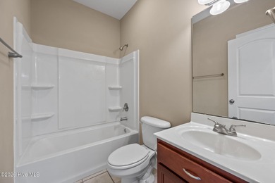 Welcome to this inviting 3-bedroom, 2-bath home nestled in the on Bear Trail Golf Club in North Carolina - for sale on GolfHomes.com, golf home, golf lot