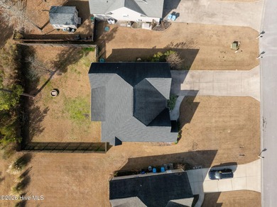 Welcome to this inviting 3-bedroom, 2-bath home nestled in the on Bear Trail Golf Club in North Carolina - for sale on GolfHomes.com, golf home, golf lot