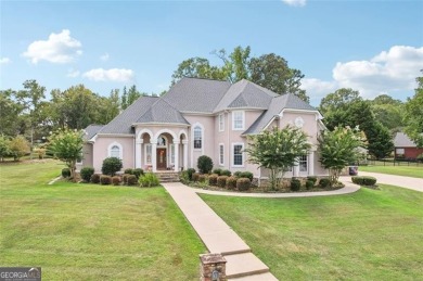 Welcome to this expansive executive-style estate, perfectly on Meadow Lakes Golf Course in Georgia - for sale on GolfHomes.com, golf home, golf lot