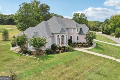 Welcome to this expansive executive-style estate, perfectly on Meadow Lakes Golf Course in Georgia - for sale on GolfHomes.com, golf home, golf lot