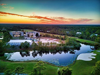 This high and dry lot overlooks a pond and the 12th green on St. James Bay in Florida - for sale on GolfHomes.com, golf home, golf lot
