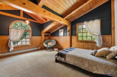 Discover your luxury with this 7-bedroom, 3-bathroom executive on Spearfish Canyon Country Club in South Dakota - for sale on GolfHomes.com, golf home, golf lot