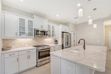 This beautifully decorated Boca Royale Sandcastle model features on Boca Royale Golf and Country Club in Florida - for sale on GolfHomes.com, golf home, golf lot