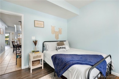 Experience lake life at its finest in this stunning 4-bedroom on The Club At Old Kinderhook in Missouri - for sale on GolfHomes.com, golf home, golf lot