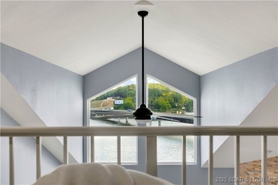Experience lake life at its finest in this stunning 4-bedroom on The Club At Old Kinderhook in Missouri - for sale on GolfHomes.com, golf home, golf lot