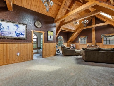 Discover your luxury with this 7-bedroom, 3-bathroom executive on Spearfish Canyon Country Club in South Dakota - for sale on GolfHomes.com, golf home, golf lot