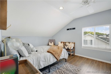 Experience lake life at its finest in this stunning 4-bedroom on The Club At Old Kinderhook in Missouri - for sale on GolfHomes.com, golf home, golf lot