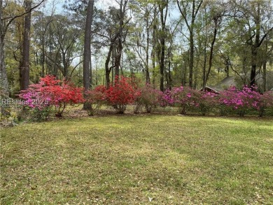 Discover this mid-century modern home in desirable Royal Pines on Ladys Island Country Club in South Carolina - for sale on GolfHomes.com, golf home, golf lot