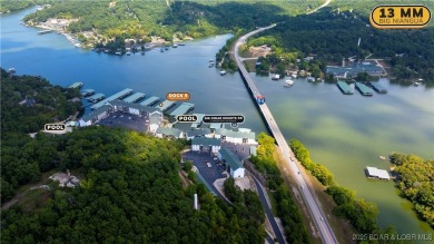 Experience lake life at its finest in this stunning 4-bedroom on The Club At Old Kinderhook in Missouri - for sale on GolfHomes.com, golf home, golf lot