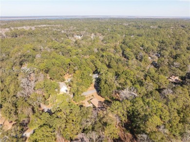 Discover this mid-century modern home in desirable Royal Pines on Ladys Island Country Club in South Carolina - for sale on GolfHomes.com, golf home, golf lot