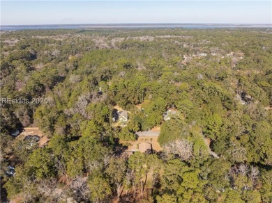 Discover this mid-century modern home in desirable Royal Pines on Ladys Island Country Club in South Carolina - for sale on GolfHomes.com, golf home, golf lot