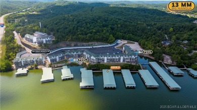 Experience lake life at its finest in this stunning 4-bedroom on The Club At Old Kinderhook in Missouri - for sale on GolfHomes.com, golf home, golf lot