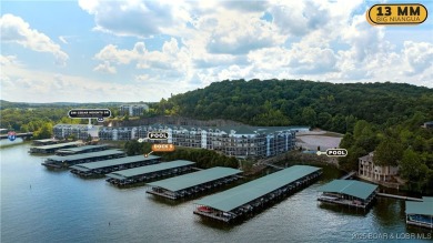 Experience lake life at its finest in this stunning 4-bedroom on The Club At Old Kinderhook in Missouri - for sale on GolfHomes.com, golf home, golf lot