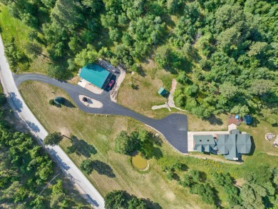 Discover your luxury with this 7-bedroom, 3-bathroom executive on Spearfish Canyon Country Club in South Dakota - for sale on GolfHomes.com, golf home, golf lot