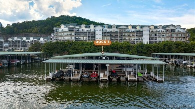 Experience lake life at its finest in this stunning 4-bedroom on The Club At Old Kinderhook in Missouri - for sale on GolfHomes.com, golf home, golf lot