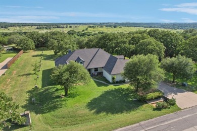 Fully updated home located on an almost 1 acre lot on the Brazos on Pecan Plantation Country Club in Texas - for sale on GolfHomes.com, golf home, golf lot