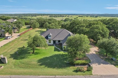 Fully updated home located on an almost 1 acre lot on the Brazos on Pecan Plantation Country Club in Texas - for sale on GolfHomes.com, golf home, golf lot