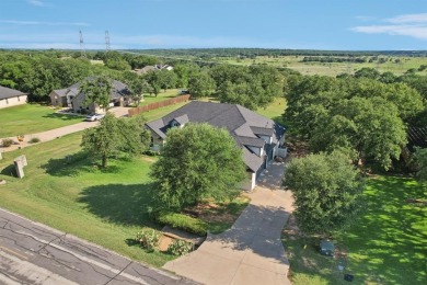 Fully updated home located on an almost 1 acre lot on the Brazos on Pecan Plantation Country Club in Texas - for sale on GolfHomes.com, golf home, golf lot