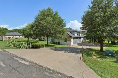 Fully updated home located on an almost 1 acre lot on the Brazos on Pecan Plantation Country Club in Texas - for sale on GolfHomes.com, golf home, golf lot