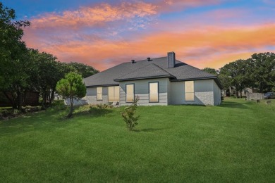 Fully updated home located on an almost 1 acre lot on the Brazos on Pecan Plantation Country Club in Texas - for sale on GolfHomes.com, golf home, golf lot