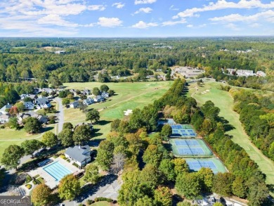 Back on market due to no fault of sellers. Beautiful brick front on Hampton Golf Village in Georgia - for sale on GolfHomes.com, golf home, golf lot