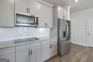 Welcome to the charming community of Lake Arrowhead nestled in on The Highlands Course at Lake Arrowhead in Georgia - for sale on GolfHomes.com, golf home, golf lot