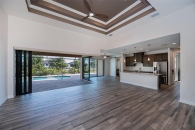 Exquisite 2021 custom-built DM Dean residence on a fully fenced on Rotonda Golf and Country Club The Palms Course in Florida - for sale on GolfHomes.com, golf home, golf lot