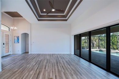 Exquisite 2021 custom-built DM Dean residence on a fully fenced on Rotonda Golf and Country Club The Palms Course in Florida - for sale on GolfHomes.com, golf home, golf lot