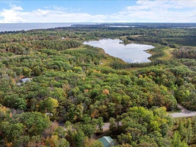 This exceptional .53-acre lot, just 1.5 hours from the Twin on Hardwoods Golf Club At Mille Lacs in Minnesota - for sale on GolfHomes.com, golf home, golf lot