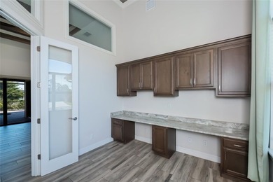 Exquisite 2021 custom-built DM Dean residence on a fully fenced on Rotonda Golf and Country Club The Palms Course in Florida - for sale on GolfHomes.com, golf home, golf lot