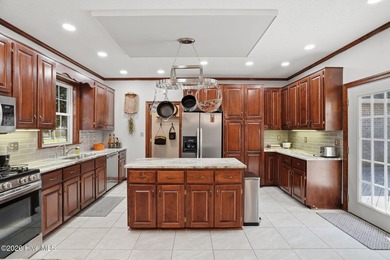 Custom-built 3BR/3.5BA brick Cape Cod situated on the 3rd on Sound Golf Links at Albemarle Plantation in North Carolina - for sale on GolfHomes.com, golf home, golf lot