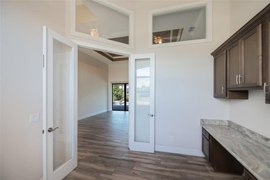 Exquisite 2021 custom-built DM Dean residence on a fully fenced on Rotonda Golf and Country Club The Palms Course in Florida - for sale on GolfHomes.com, golf home, golf lot