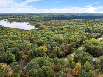 This exceptional .53-acre lot, just 1.5 hours from the Twin on Hardwoods Golf Club At Mille Lacs in Minnesota - for sale on GolfHomes.com, golf home, golf lot