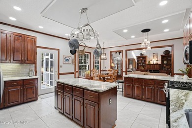 Custom-built 3BR/3.5BA brick Cape Cod situated on the 3rd on Sound Golf Links at Albemarle Plantation in North Carolina - for sale on GolfHomes.com, golf home, golf lot