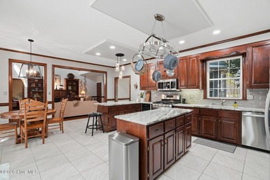 Custom-built 3BR/3.5BA brick Cape Cod situated on the 3rd on Sound Golf Links at Albemarle Plantation in North Carolina - for sale on GolfHomes.com, golf home, golf lot