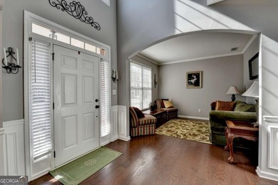 Perfectly positioned on the 8th green in highly desirable on Hampton Golf Village in Georgia - for sale on GolfHomes.com, golf home, golf lot