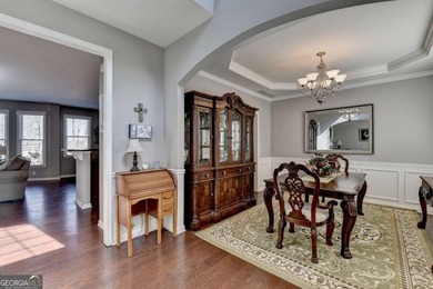 Perfectly positioned on the 8th green in highly desirable on Hampton Golf Village in Georgia - for sale on GolfHomes.com, golf home, golf lot