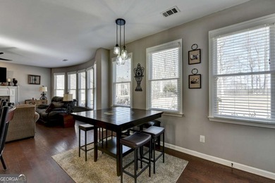 Perfectly positioned on the 8th green in highly desirable on Hampton Golf Village in Georgia - for sale on GolfHomes.com, golf home, golf lot