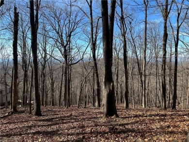 This 1.34 acre wooded lot is located close to the front gate of on Bent Tree Golf Course in Georgia - for sale on GolfHomes.com, golf home, golf lot