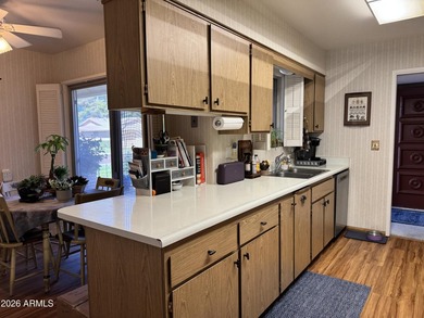 Spectacular views of the 12th fairway with just a chip shot to on Sun City Country Club in Arizona - for sale on GolfHomes.com, golf home, golf lot