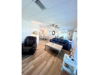This beautiful two-bedroom, two-bath home is located in the on Pine Lakes Country Club in Florida - for sale on GolfHomes.com, golf home, golf lot